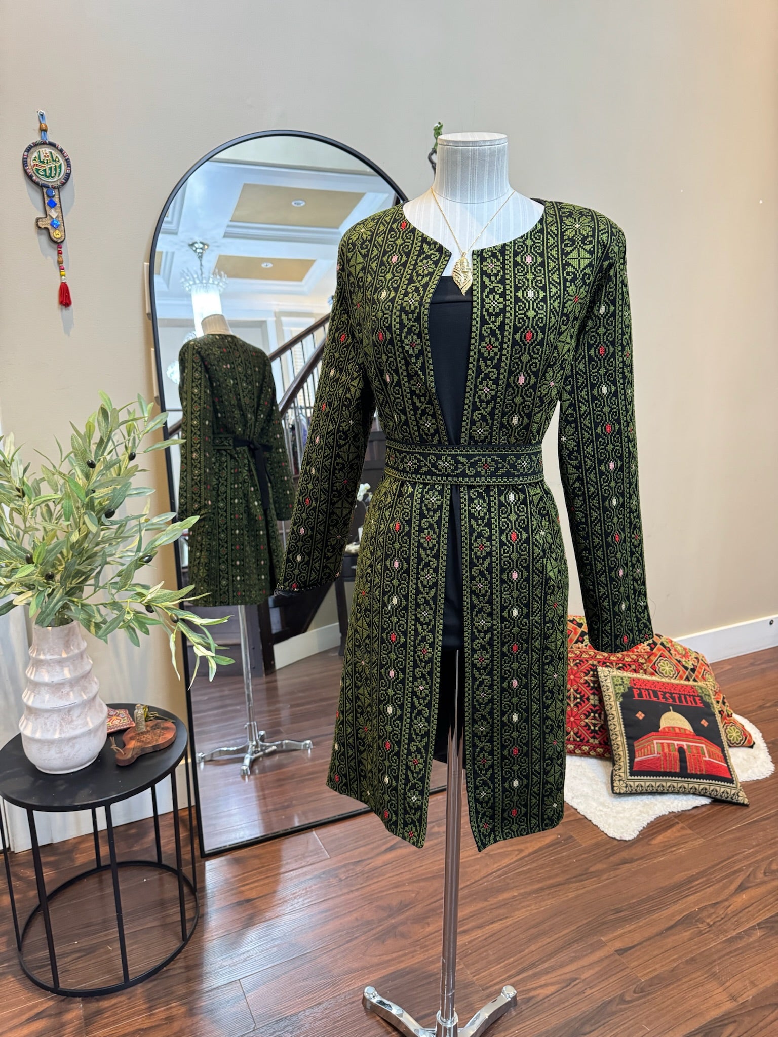 Green Palestinian embroidery blazer with belt .